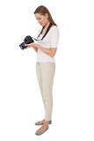 Side view of a beautiful female photographer