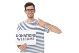 Man pointing at donation welcome note