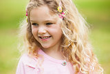 Close-up of a smiling girl at park