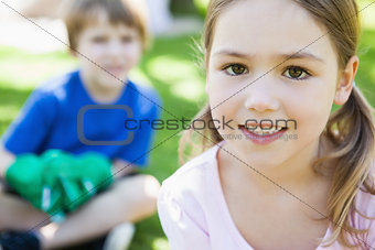 Two smiling kids at the park