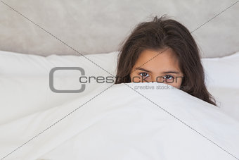 Portrait of a girl resting in bed