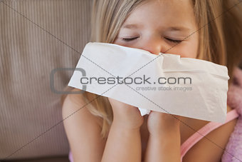 Cute little girl suffering from cold