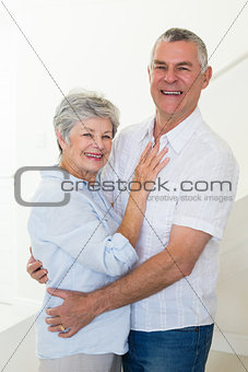Happy senior couple dancing together