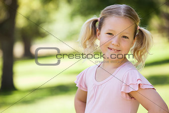 Portrait of a smiling young girl at park