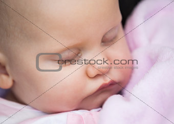 Cute baby sleeping with eyes closed