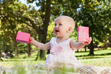 Cute baby with box at the park