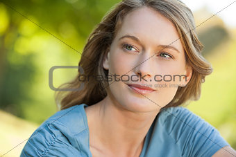 Close-up of thoughtful woman looking away in park