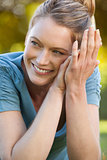 Close-up portrait of beautiful relaxed woman at park
