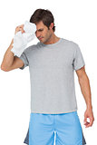 Fit young man with towel