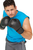 Determined male boxer focused on his training
