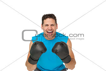 Portrait of a determined male boxer screaming