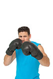 Determined male boxer focused on his training