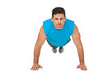 Portrait of a determined man doing push ups