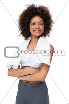 Smiling fit young woman with towel