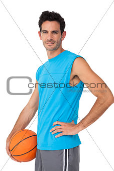 Portrait of a basketball player with ball