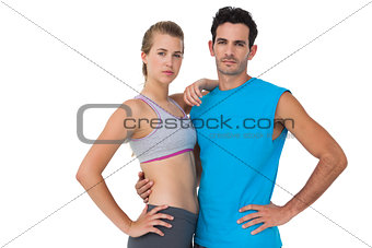 Portrait of a serious sporty young couple