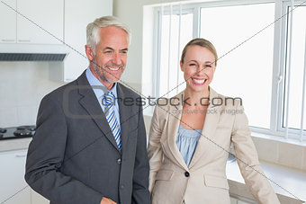 Happy business couple before work in morning