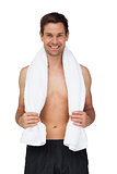 Portrait of a smiling shirtless man with towel