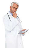 Portrait of a male doctor using digital tablet