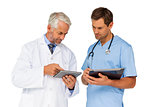 Portrait of male doctor and surgeon with digital tablets