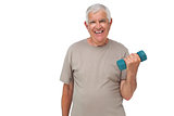 Portrait of a happy senior man exercising with dumbbell