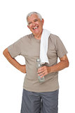 Portrait of a senior man with water bottle