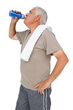 Active senior man drinking water