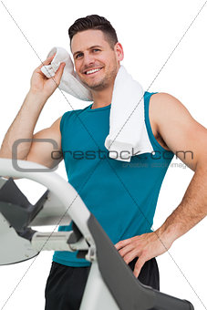 Young man running on a treadmill