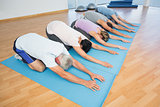 Fitness group bowing in row