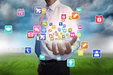 Businessman presenting app icons