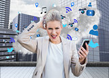 Angry businesswoman holding smartphone with cloud computing graphic