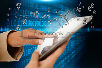 Businesswoman touching tablet with euro signs
