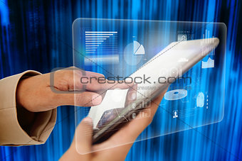 Businesswoman touching tablet with interface