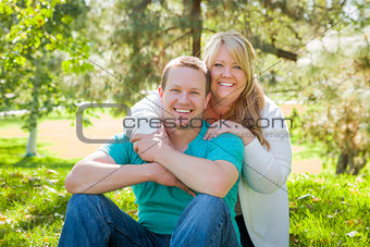 Young Attractive Couple Hugging in the Park