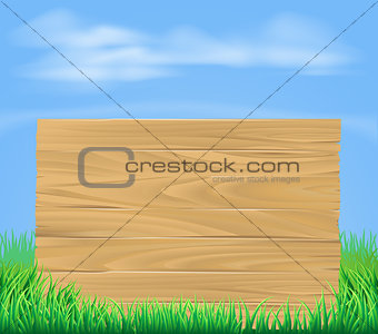 Wooden sign in field