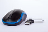 Black blue computer mouse with an usb stick