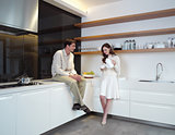 young couple in the kitchen zx