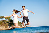 happy young couple having fun in summer holiday vacation