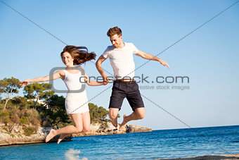 happy young couple having fun in summer holiday vacation