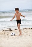 happy family father two kids playing football on beach summer 