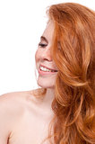 beautiful young smiling woman with red hair and freckles isolated