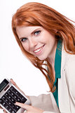 attractive smiling redhead business woman with calculator isolated