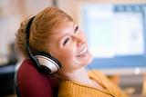 Smiling woman on headphones