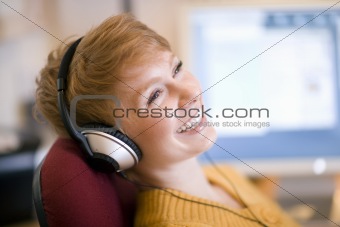 Smiling woman on headphones