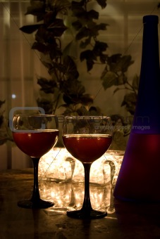 Late night wine by candlelight for two.
