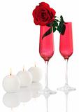 Isolated; Romantic Red Champagne Flutes with Fresh Red Rose and 