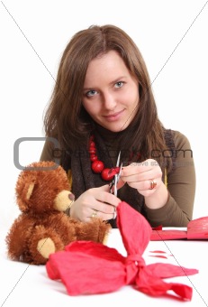 girl is preparing gift
