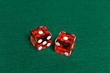 Red Casino Dice with Snake Eyes showing.