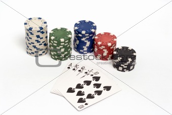 A royal straight flush hand with colored poker chips.
