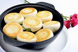 Chinese Food: Toasted Dumplings in a black pot